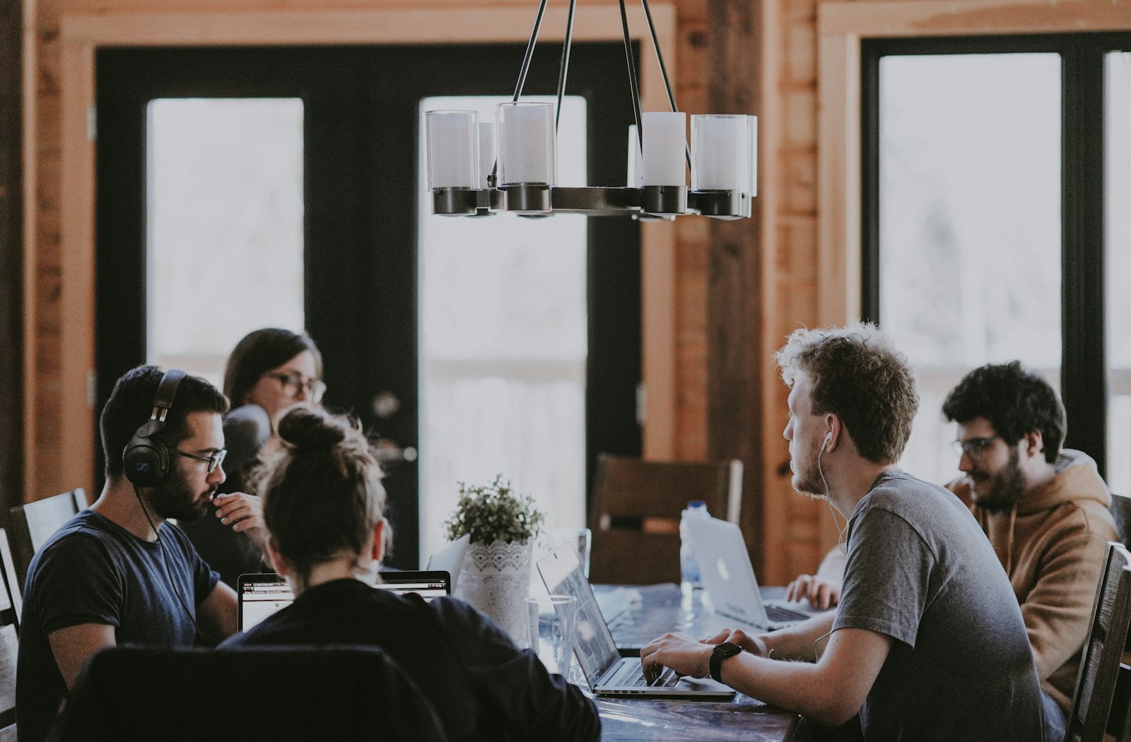 Team in discussion in an office lounge