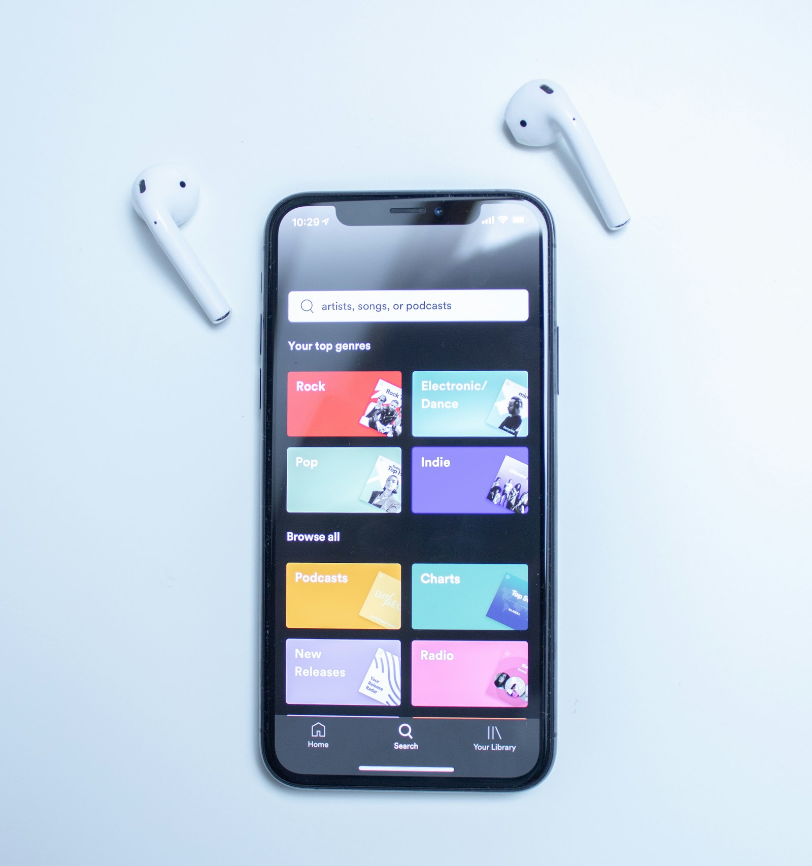 Smartphone displaying a colourful mobile app interface